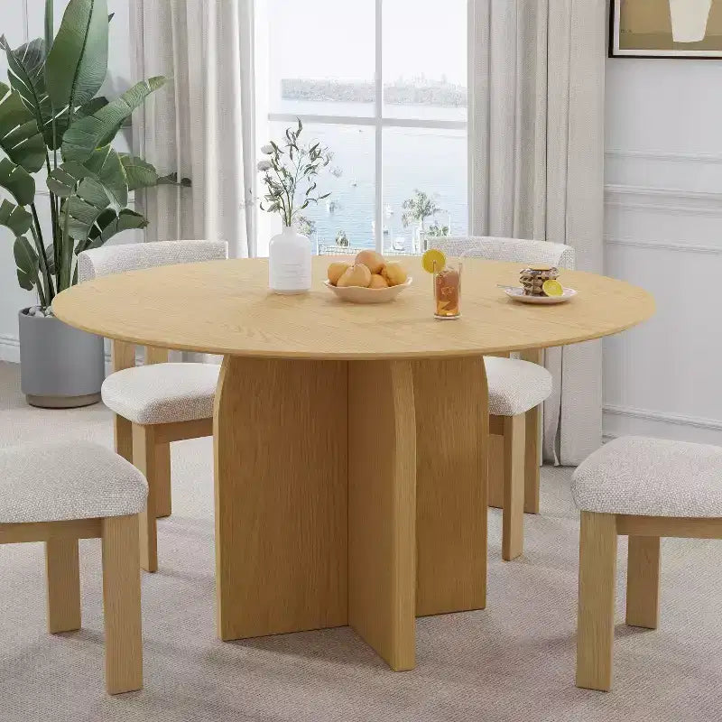 Tavolo da pranzo rotondo con piedistallo giallo, per un massimo di 6 persone